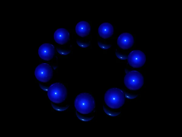 Sphères bleues isolées sur noir — Photo