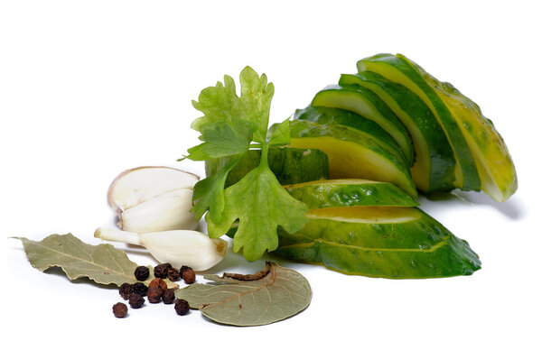 Slices of Pickled cucumbers and spices
