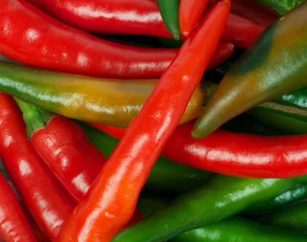 Chili peppers background — Stock Photo, Image