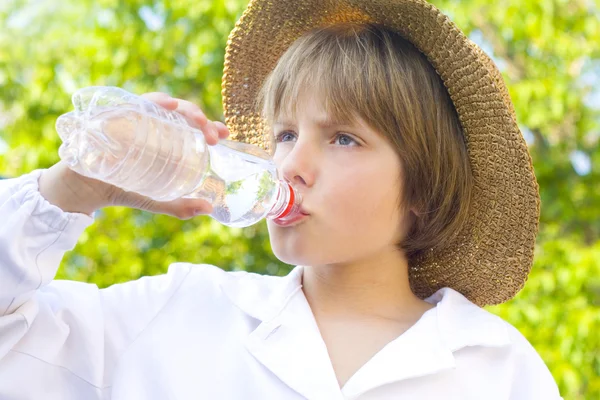 Boy drinking water — Stock Photo, Image