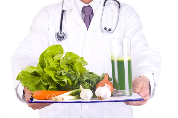 Men doctor holding fresh vegetables — Stock Photo, Image
