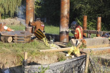 Two welders on Construction Site clipart