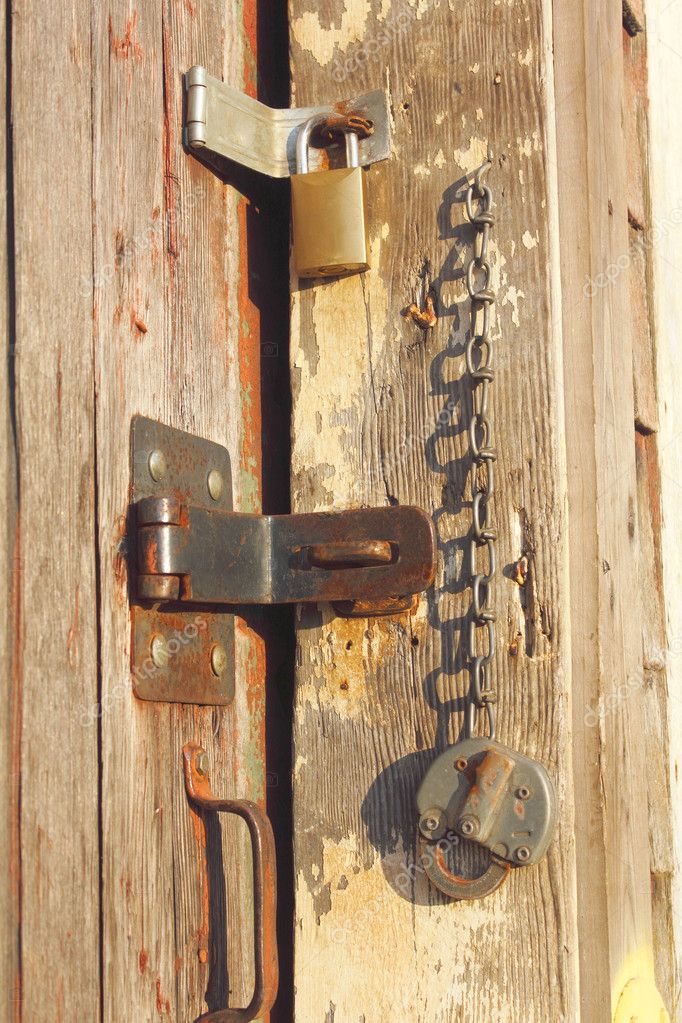 Locks On An Old Shed Door Stock Photo C Modfos 11871590