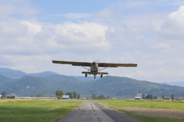 Single Engine Plane Taking Off clipart