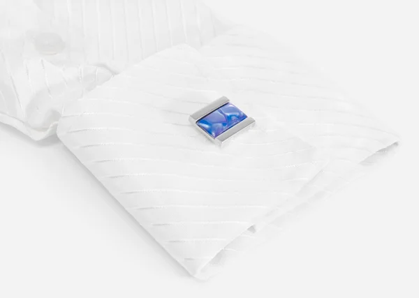 stock image White sleeve with blue cuff link