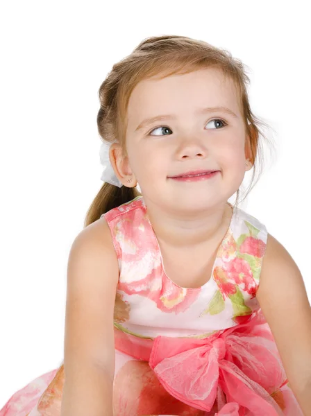 Portrét roztomilý usměvavá holčička v šatech — Stock fotografie
