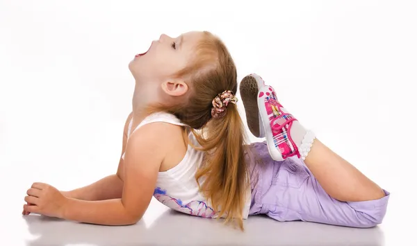 Gymnast schattig klein meisje geïsoleerd — Stockfoto