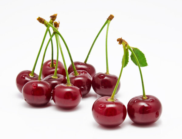 Wet cherry isolated on a white