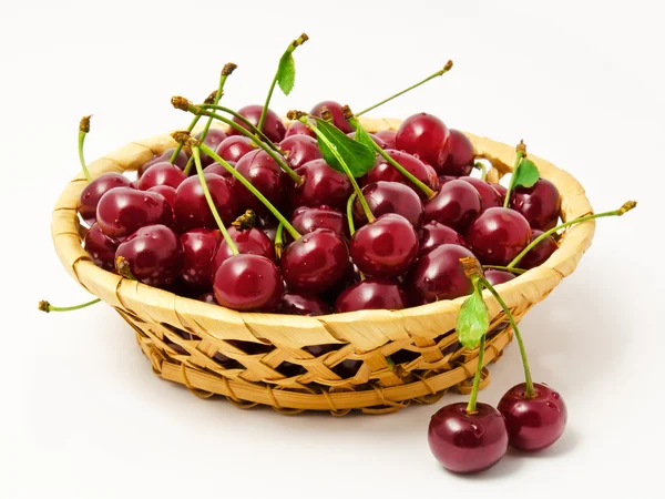 Basket with ripe wet cherry isolated — Stock Photo, Image