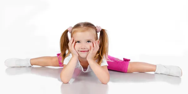 Jimnastikçi izole sevimli küçük kız — Stok fotoğraf