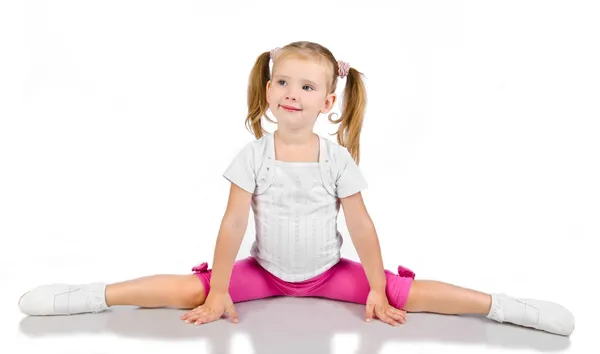 Gymnast schattig klein meisje geïsoleerd — Stockfoto