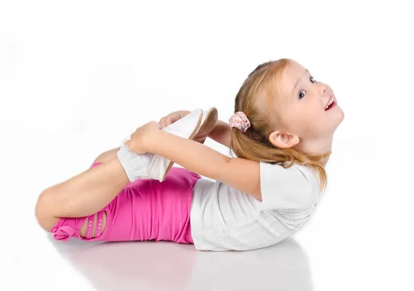 Gimnastyk cute dziewczynka na białym tle Zdjęcia Stockowe bez tantiem