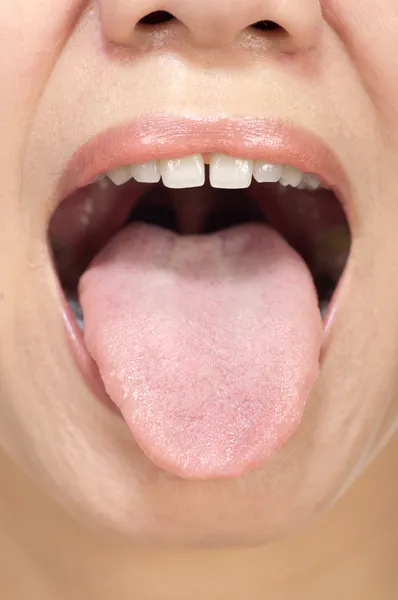 Жінка язик — стокове фото