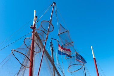 Fishing nets hanging to dry clipart