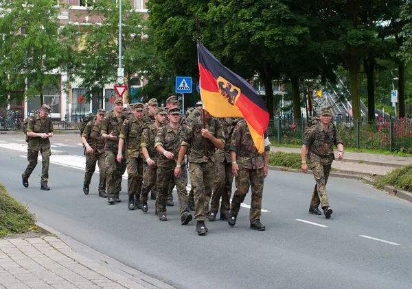 German soldiers walking the International Four Days Marches Nijmegen — Stock Image German soldiers walking the International Four Days Marches Nijmegen Stock Photo
