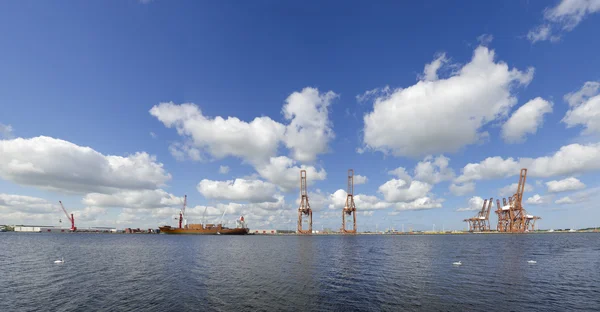 stock image Harbor cranes with ship