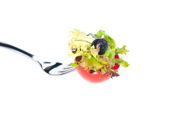 Tartina di pomodoro e insalata su una forchetta — Foto Stock