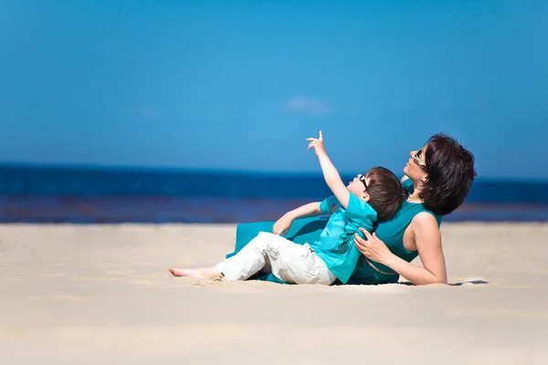 Mother and her little son together at beach — Stock Photo, Image
