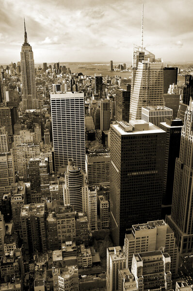 Vertical aerial photo of sepia colored Manhattan, Empire State Building in background