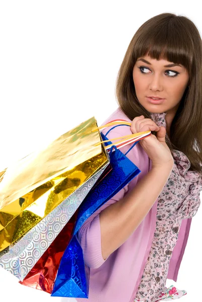 A fare shopping. Bella donna con pacchetti di colori — Foto Stock