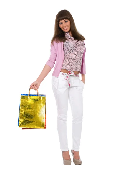 По магазинам. Красивая женщина с цветовыми пакетами — стоковое фото