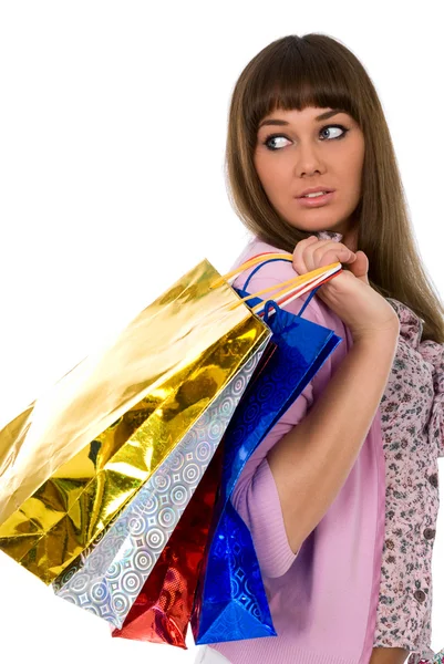По магазинам. Красивая женщина с цветовыми пакетами — стоковое фото
