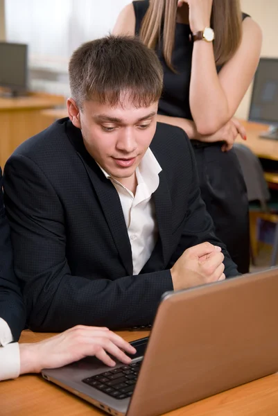 Young and successful businessman at office — Stock Photo, Image
