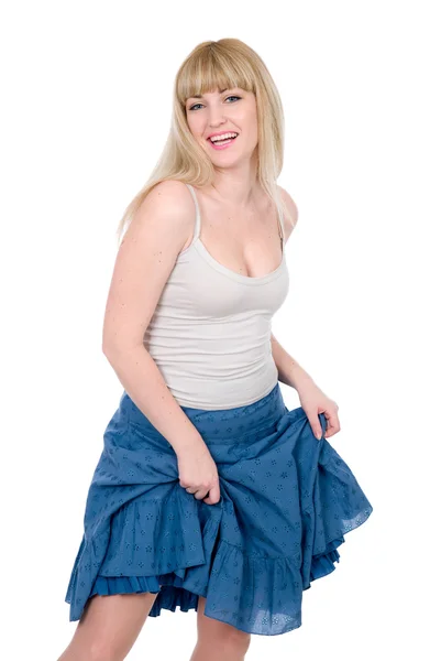 Веселая блондинка в юбке — стоковое фото