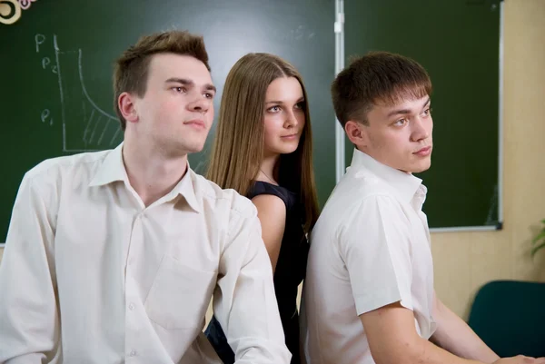 Team of young business looking aside — Stock Photo, Image