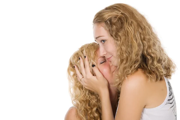 Beautiful girl pressed head of girlfriend to itself — Stock Photo, Image