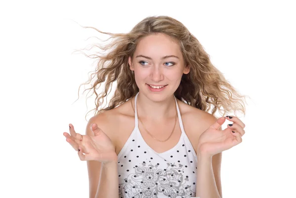 Menina bonita com um cabelo voador olha para o lado — Fotografia de Stock
