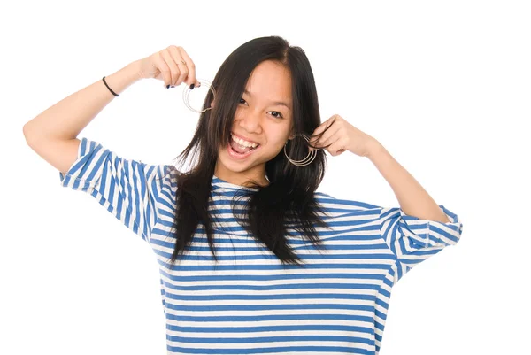 Cheerful girl shows earrings — Stock Photo, Image