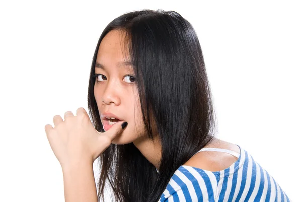 Retrato de chica asiática con un dedo en un labio — Foto de Stock