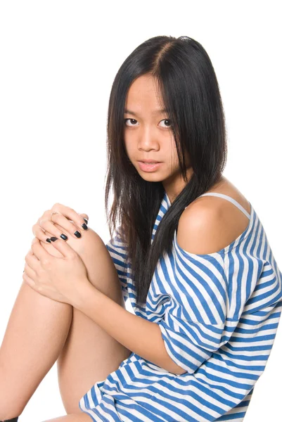 Retrato de menina com mãos em um colo — Fotografia de Stock
