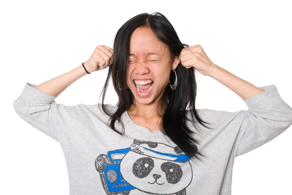 Girl pulls ears and shouts — Stock Photo, Image