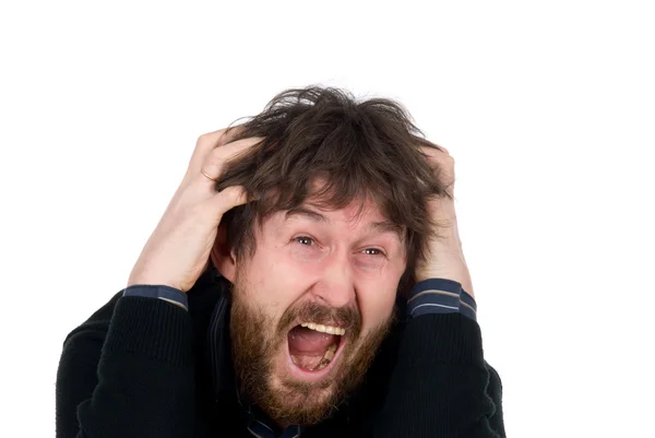 Vousatý muž křičí a drží ruce hlava — Stock fotografie
