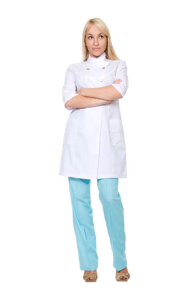 Retrato del médico en bata blanca y pantalón azul —  Fotos de Stock