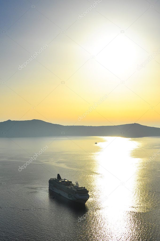 Beautiful sea sunset with mountain and boat