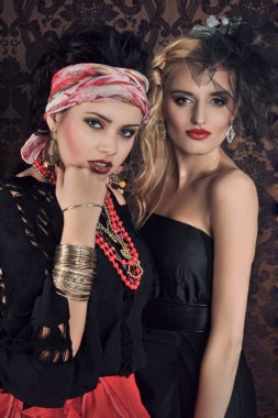Portrait of gorgeous gypsy woman with another women clipart