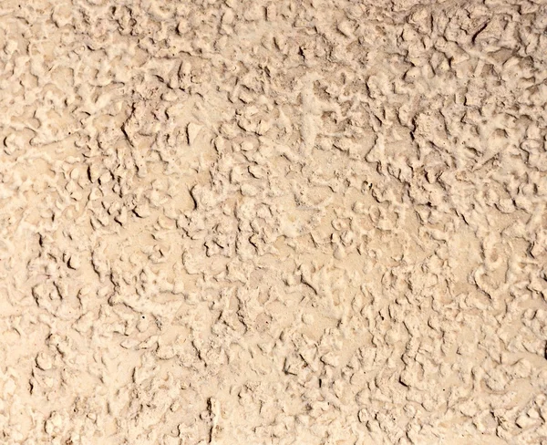 ベージュ色の石造りの背景 — ストック写真