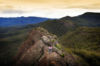 Woman on Mountain Top clipart