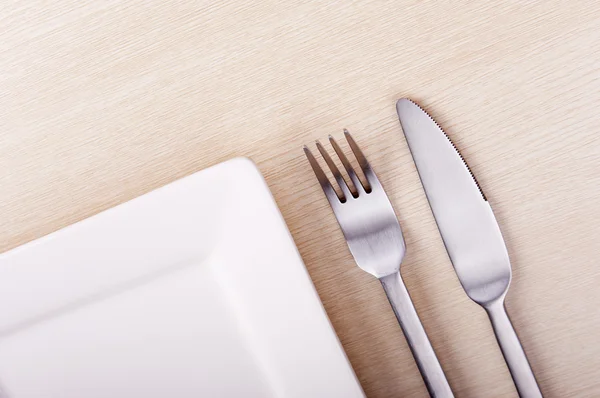 Kniv, gaffel och tallrik — Stockfoto