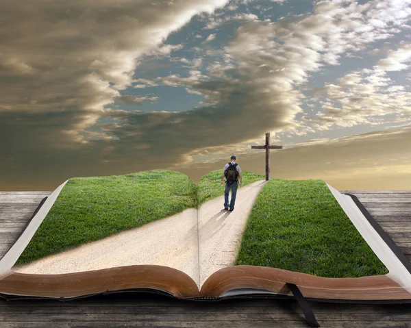 Open bible with man and cross — Stock Photo, Image