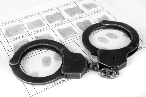 Handcuff and fingerprint — Stock Photo, Image