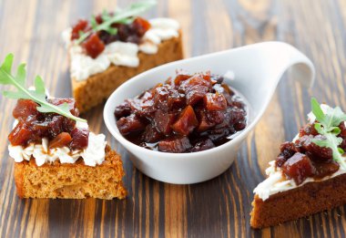 Pumpkin and tomato chutney on pumpkin bread clipart