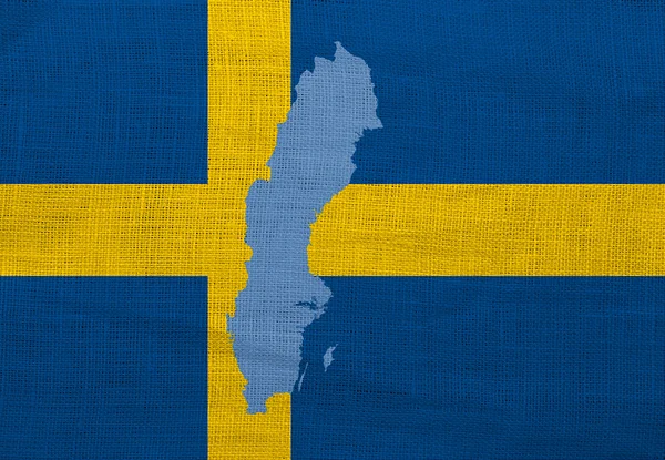 Flagge und Landkarte von Schweden auf einem Sacktuch — Stockfoto