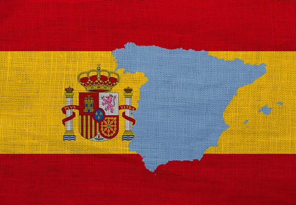 Flagge und Landkarte von Spanien auf einem Sacktuch — Stockfoto