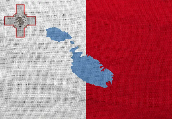 Bandera y mapa de Malta en un saco — Foto de Stock
