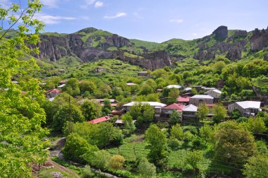 Houses on slope in Armenia clipart