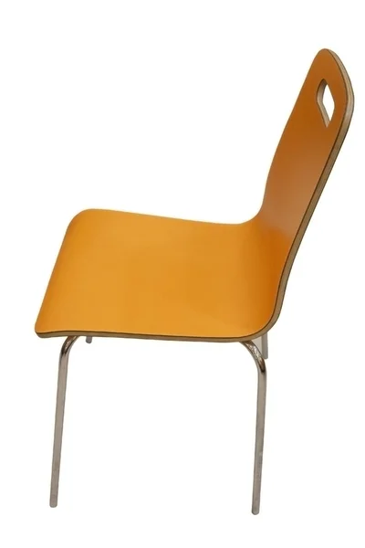 Pomarańczowy fotel po stronie — Zdjęcie stockowe